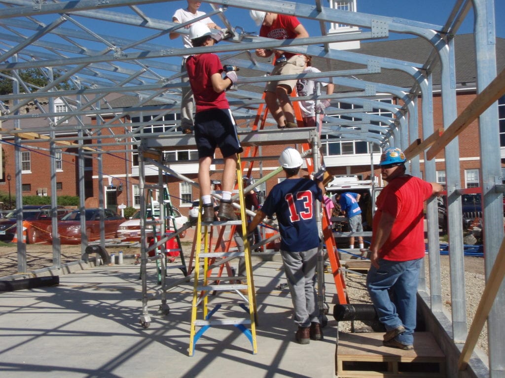 Students building greenhouse