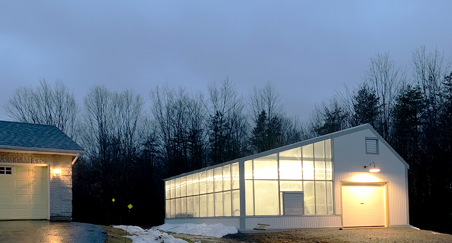 greenhouse at night with lights on